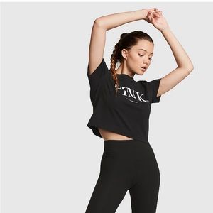 Women's cropped Victoria's Secret T-shirt.